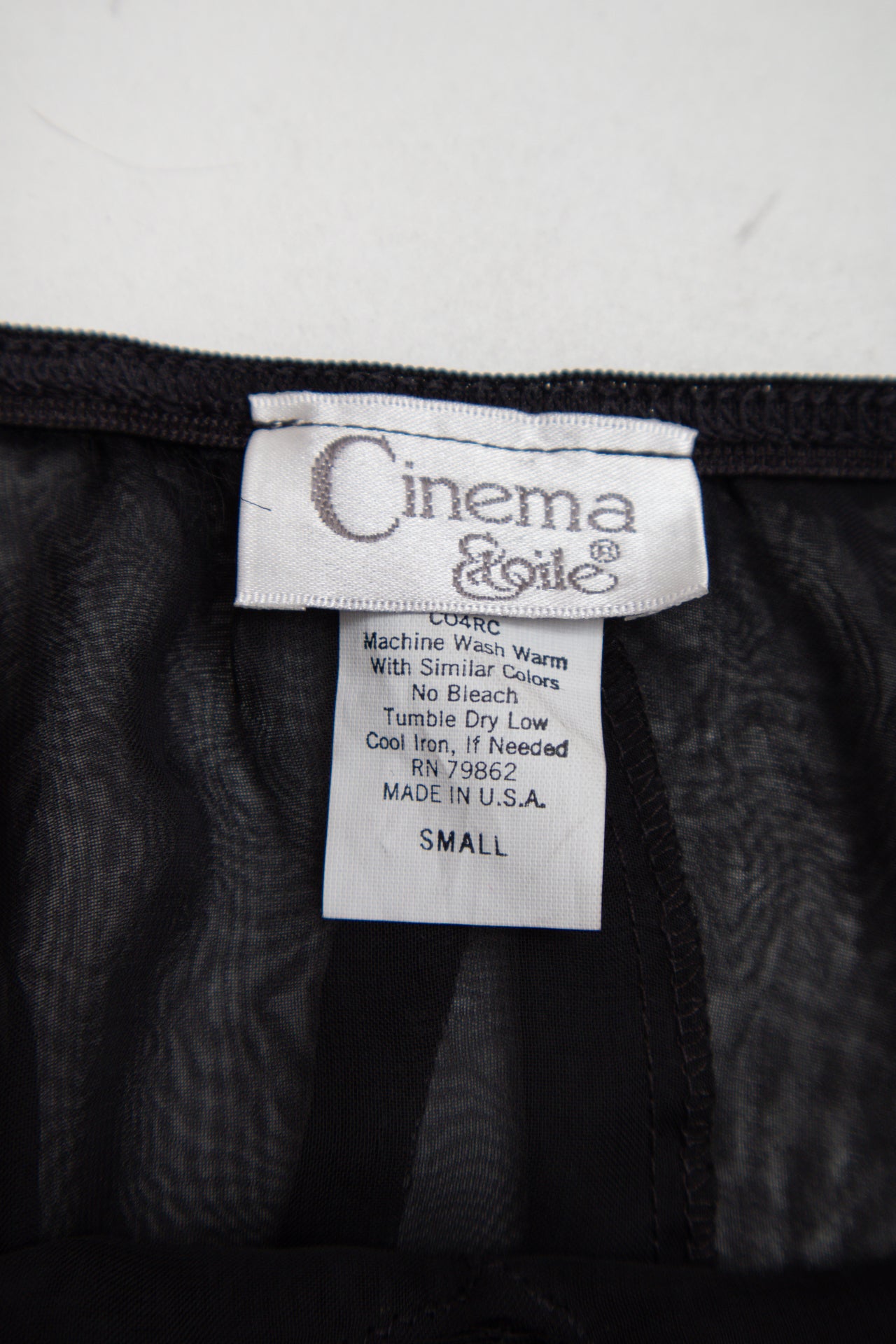 #49 U.S.A. Cinema Etoile black asym cami | c. 159 | size 8