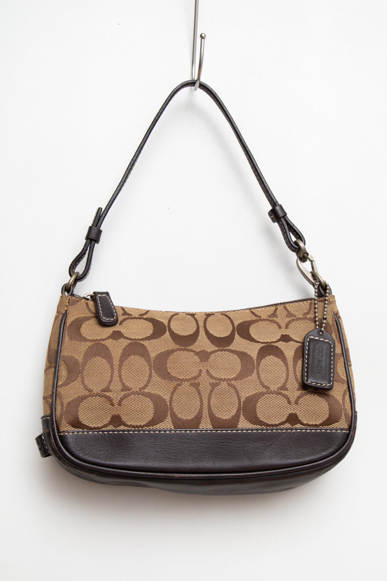 #209 Classic coach denim dark brown | C. 152