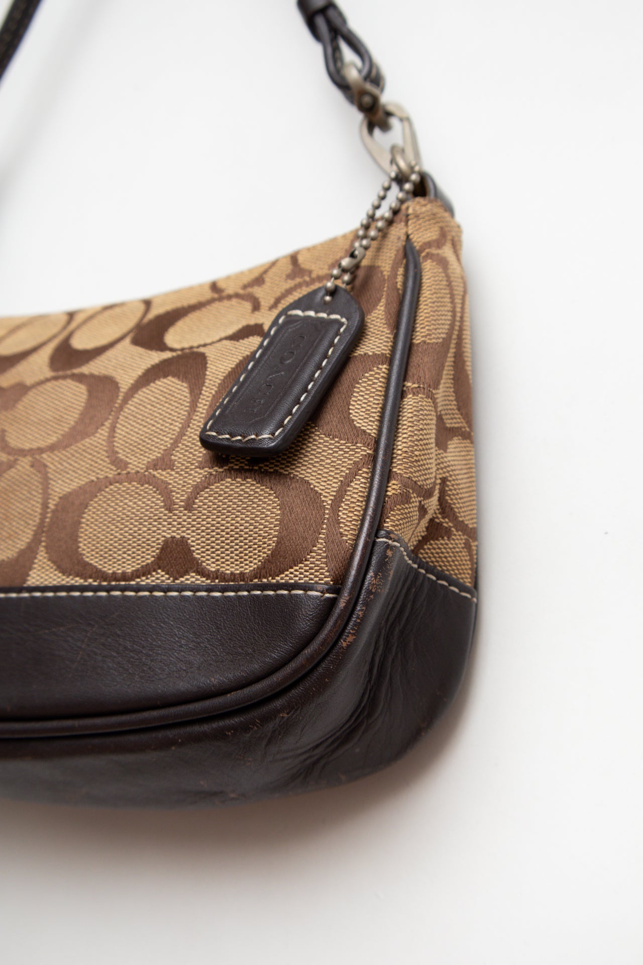 #209 Classic coach denim dark brown | C. 152