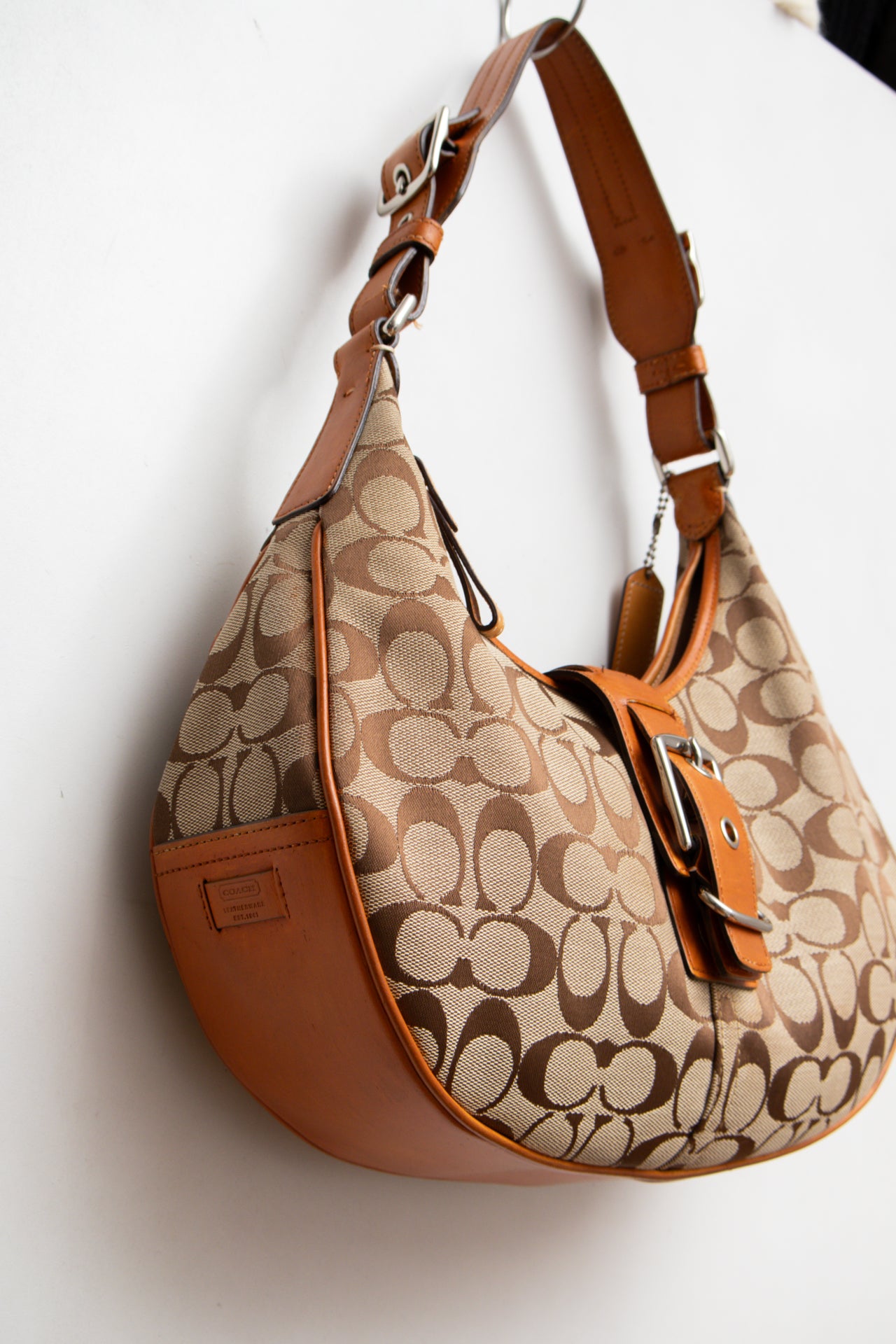 #211 Coach buckle tan hobo bag | C. 152
