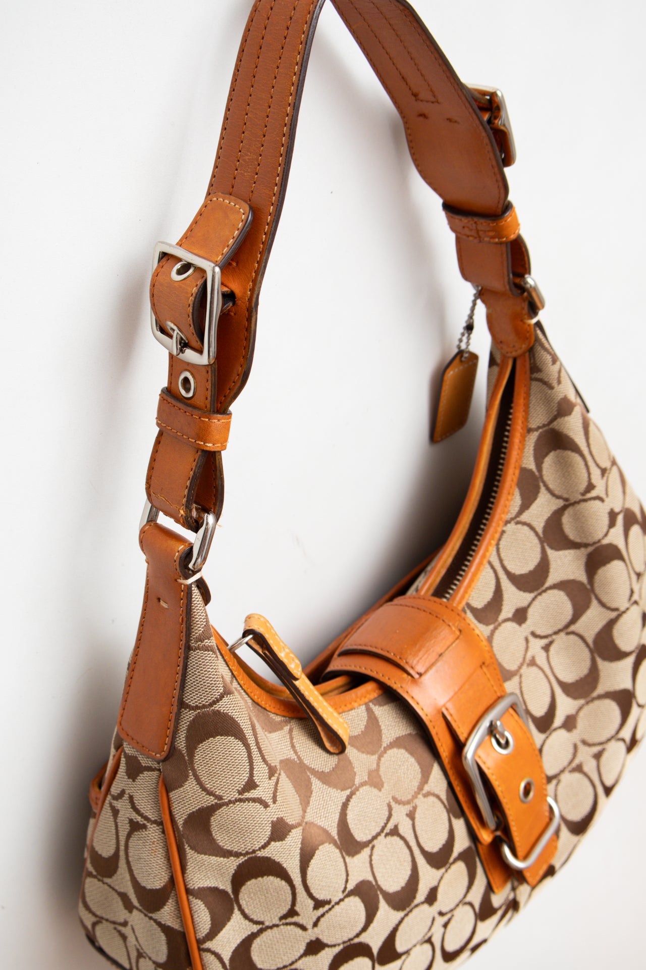 #211 Coach buckle tan hobo bag | C. 152