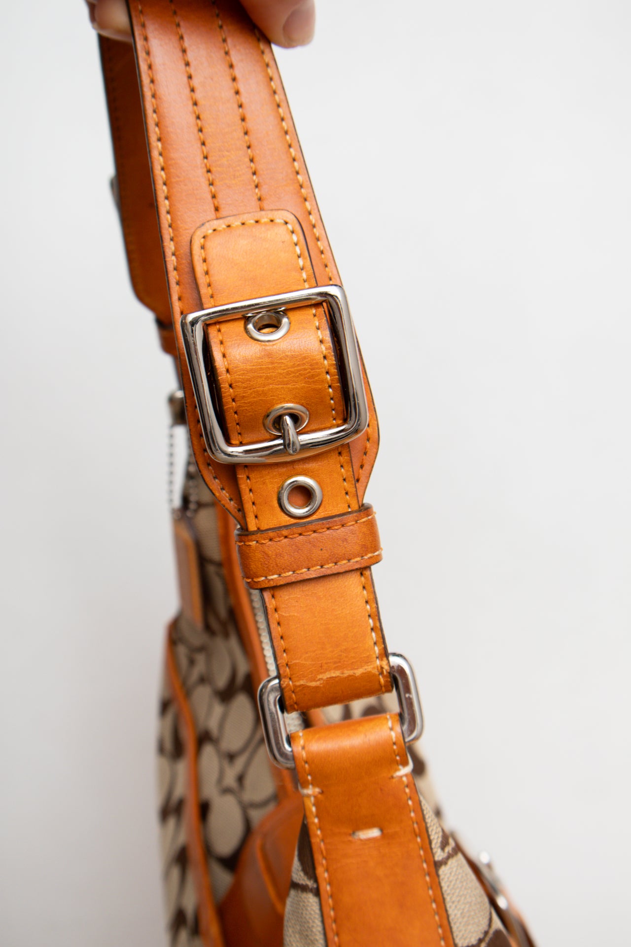 #211 Coach buckle tan hobo bag | C. 152