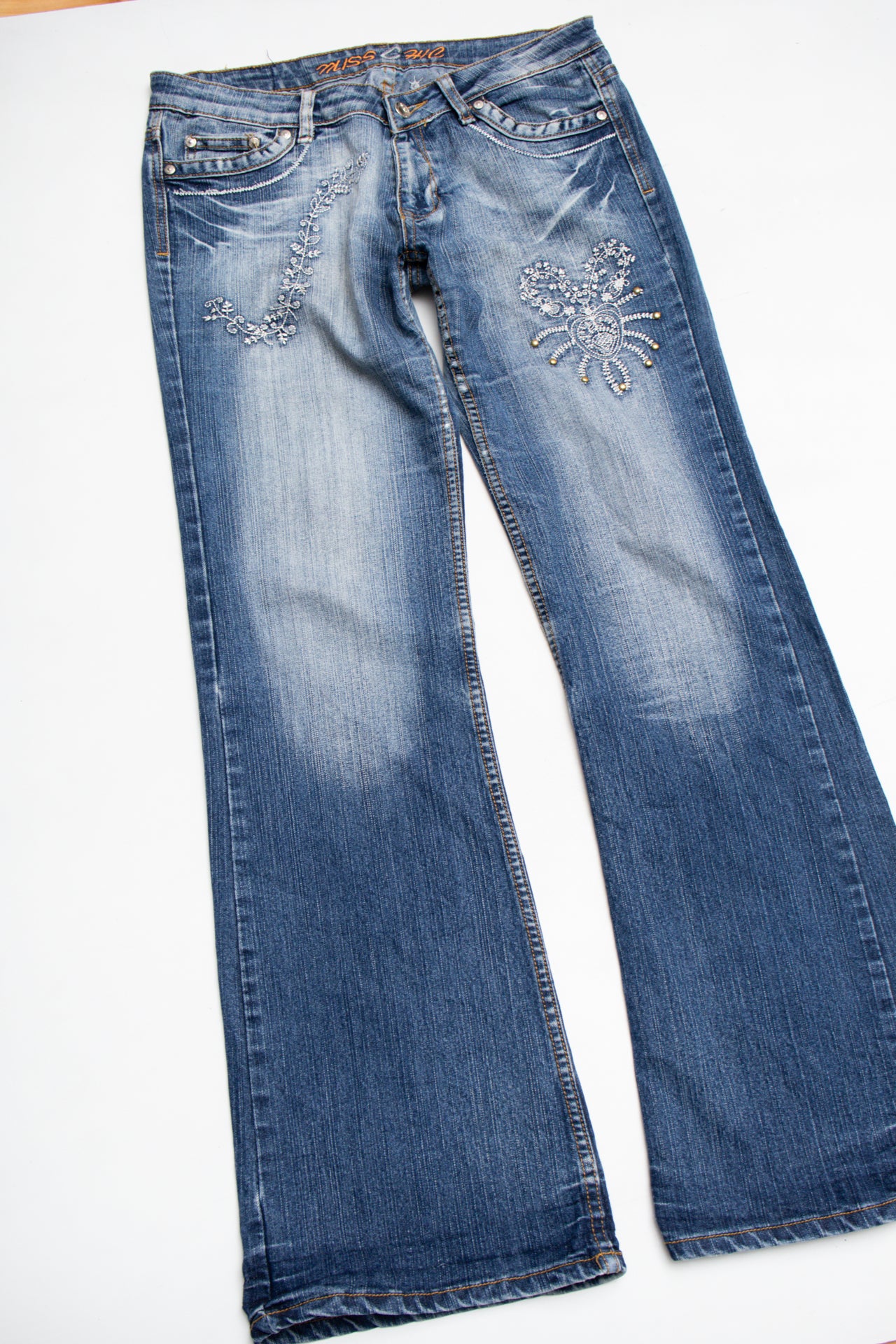 #173 Embroidered studded stonewash flared jeans | Size 10 | C. 152