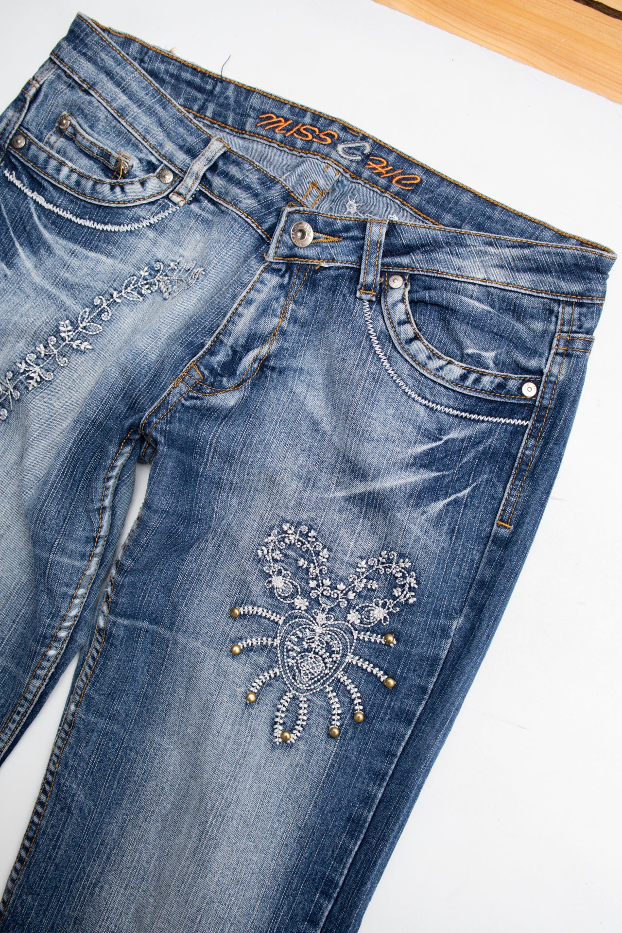 #173 Embroidered studded stonewash flared jeans | Size 10 | C. 152