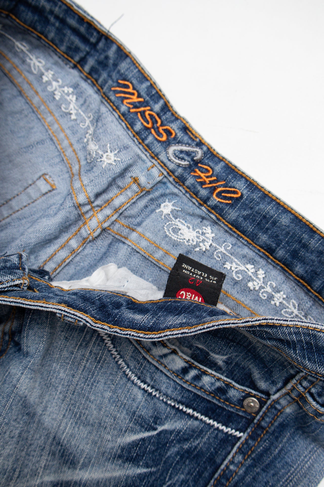 #173 Embroidered studded stonewash flared jeans | Size 10 | C. 152