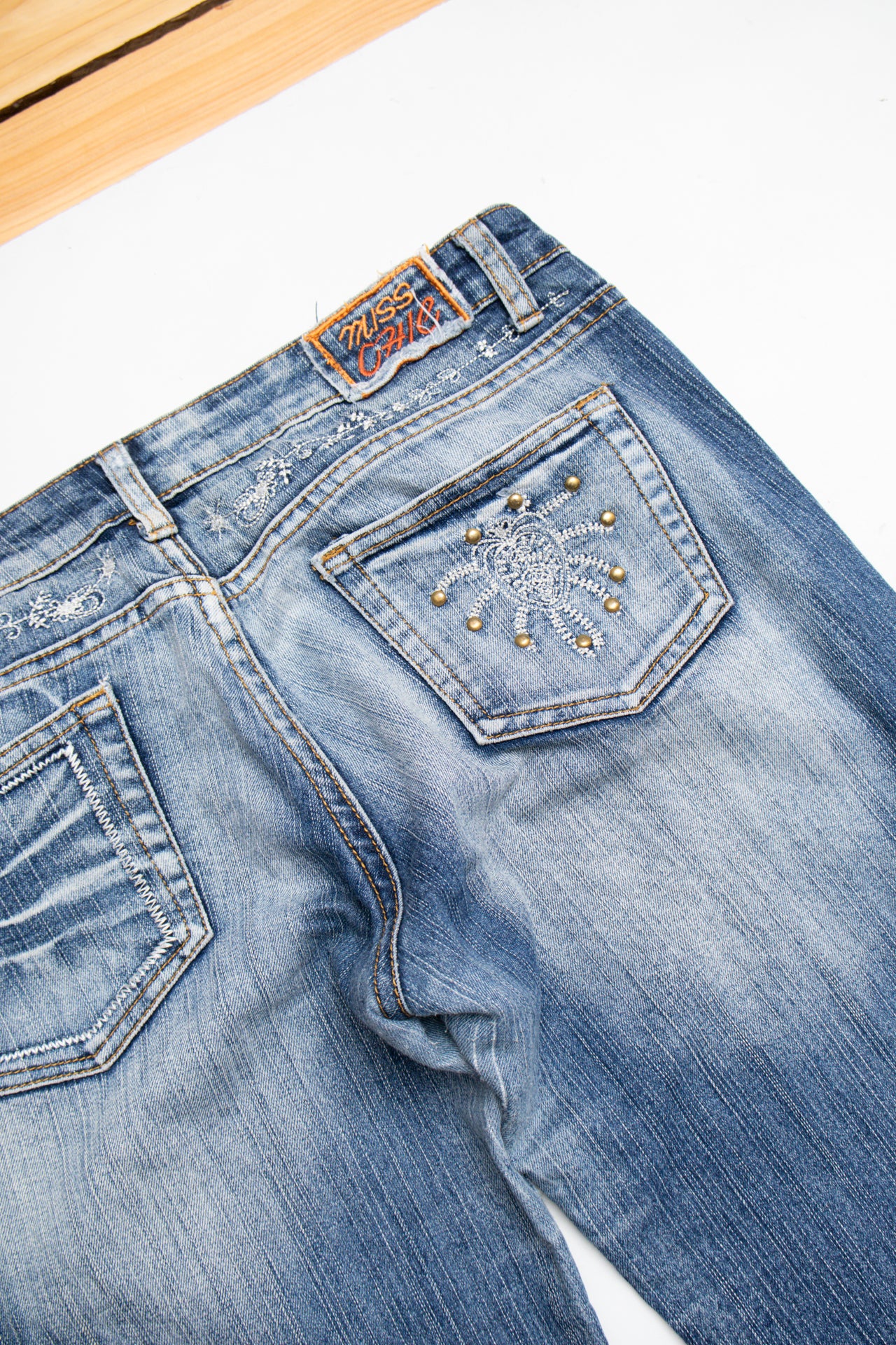 #173 Embroidered studded stonewash flared jeans | Size 10 | C. 152