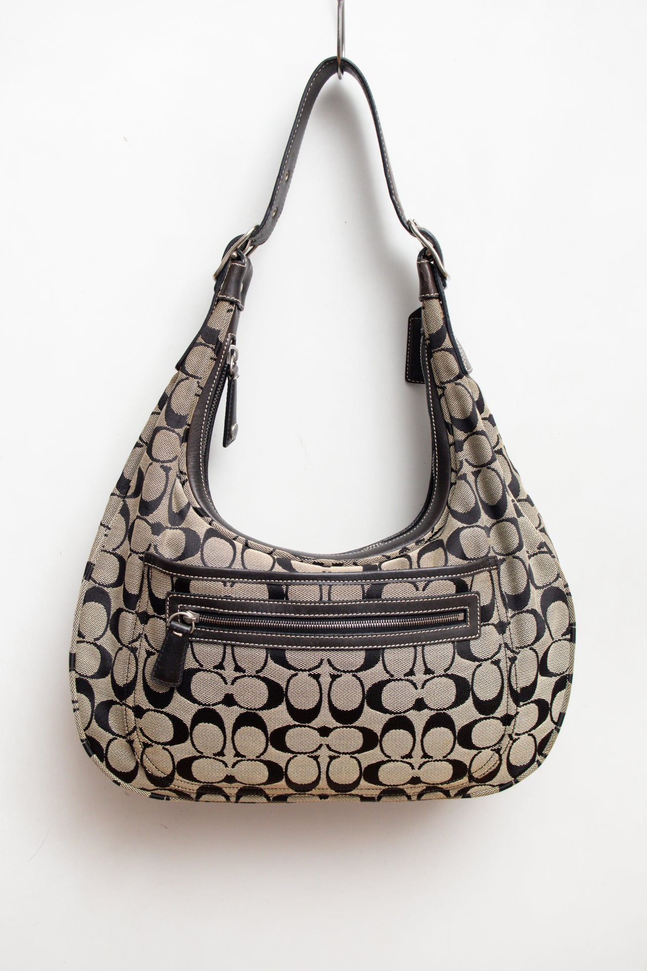 #246 Coach monogram handbag | c. 159