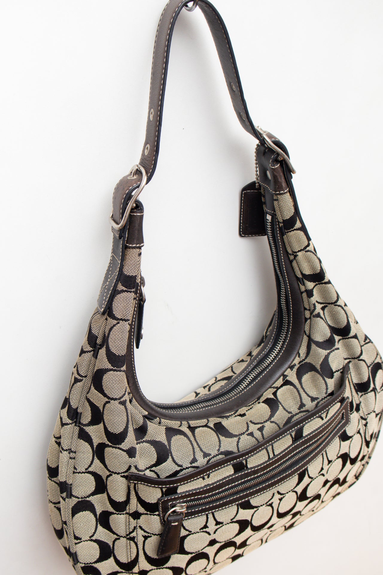 #246 Coach monogram handbag | c. 159