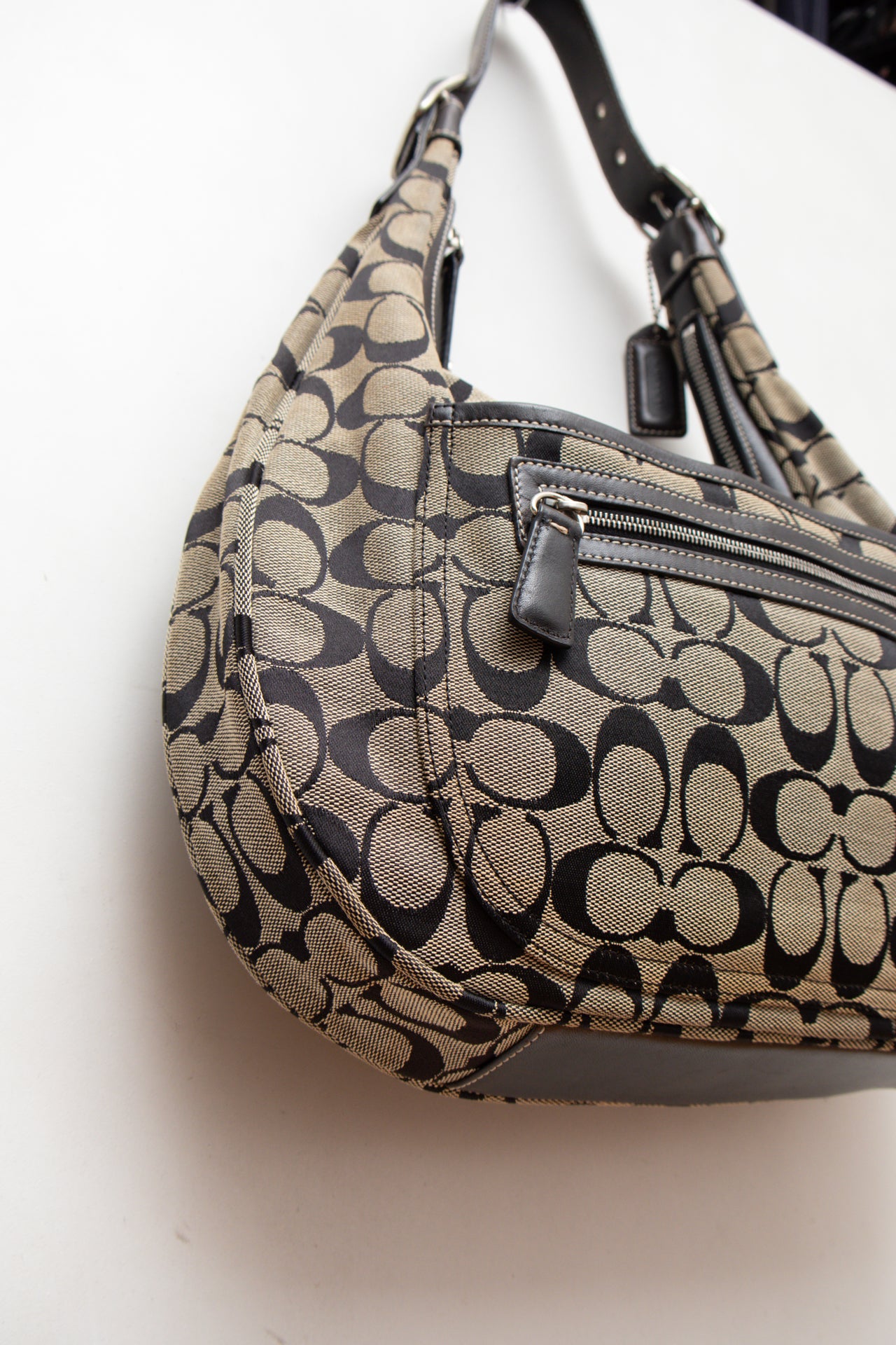 #246 Coach monogram handbag | c. 159
