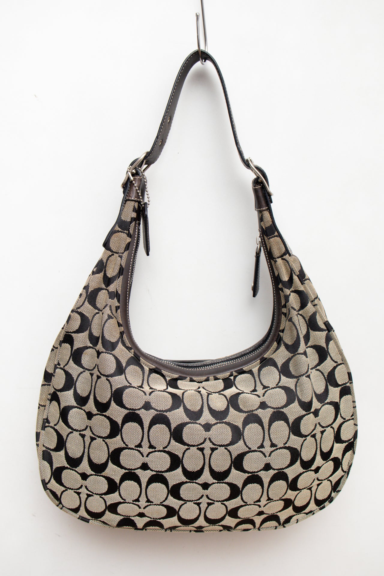 #246 Coach monogram handbag | c. 159
