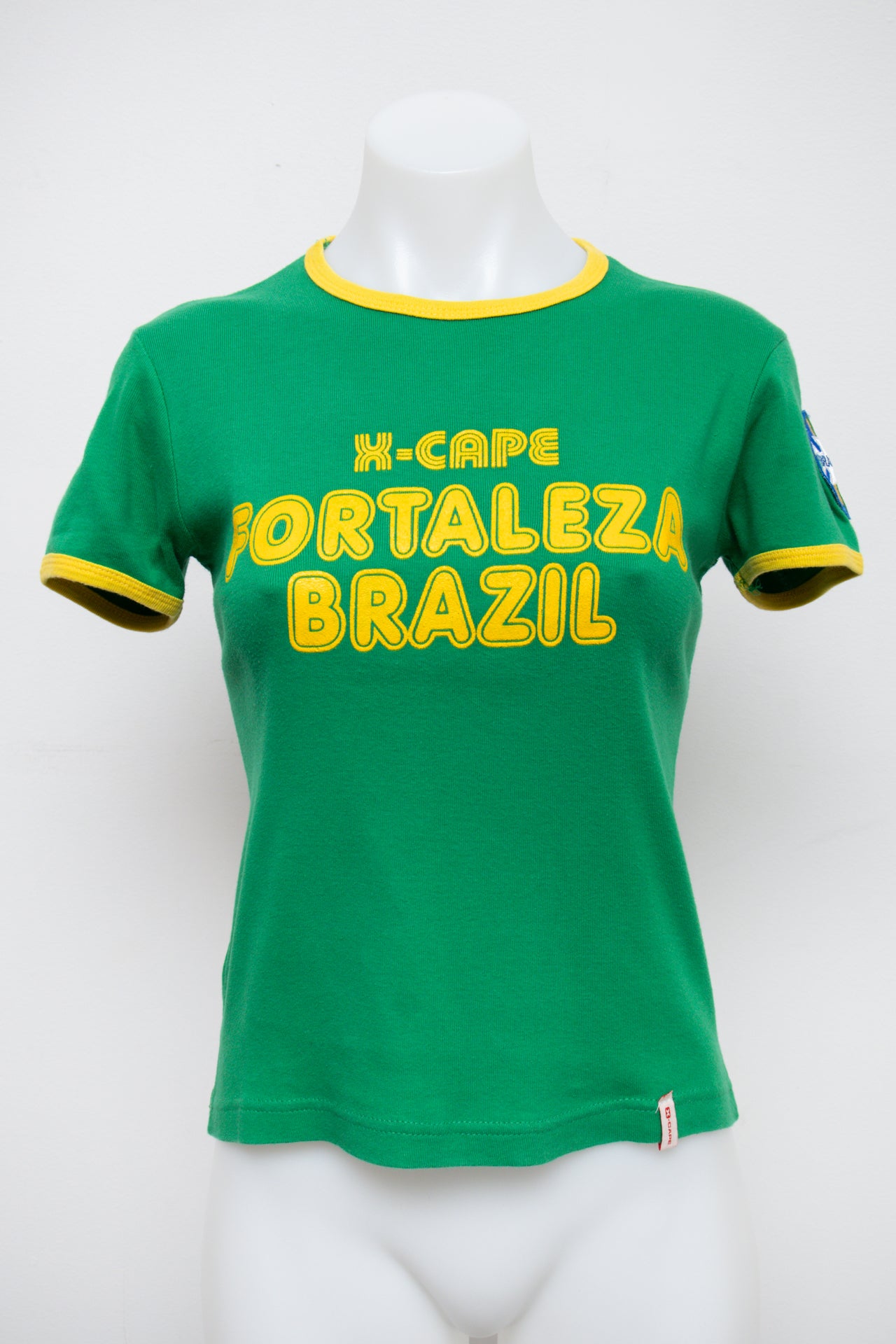 #69 X-cape Feeling T-shirt Green | c. 196 | Size 10/12