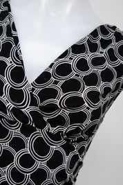 #028 George Short Sleeve Black | c. 209 | Size 12