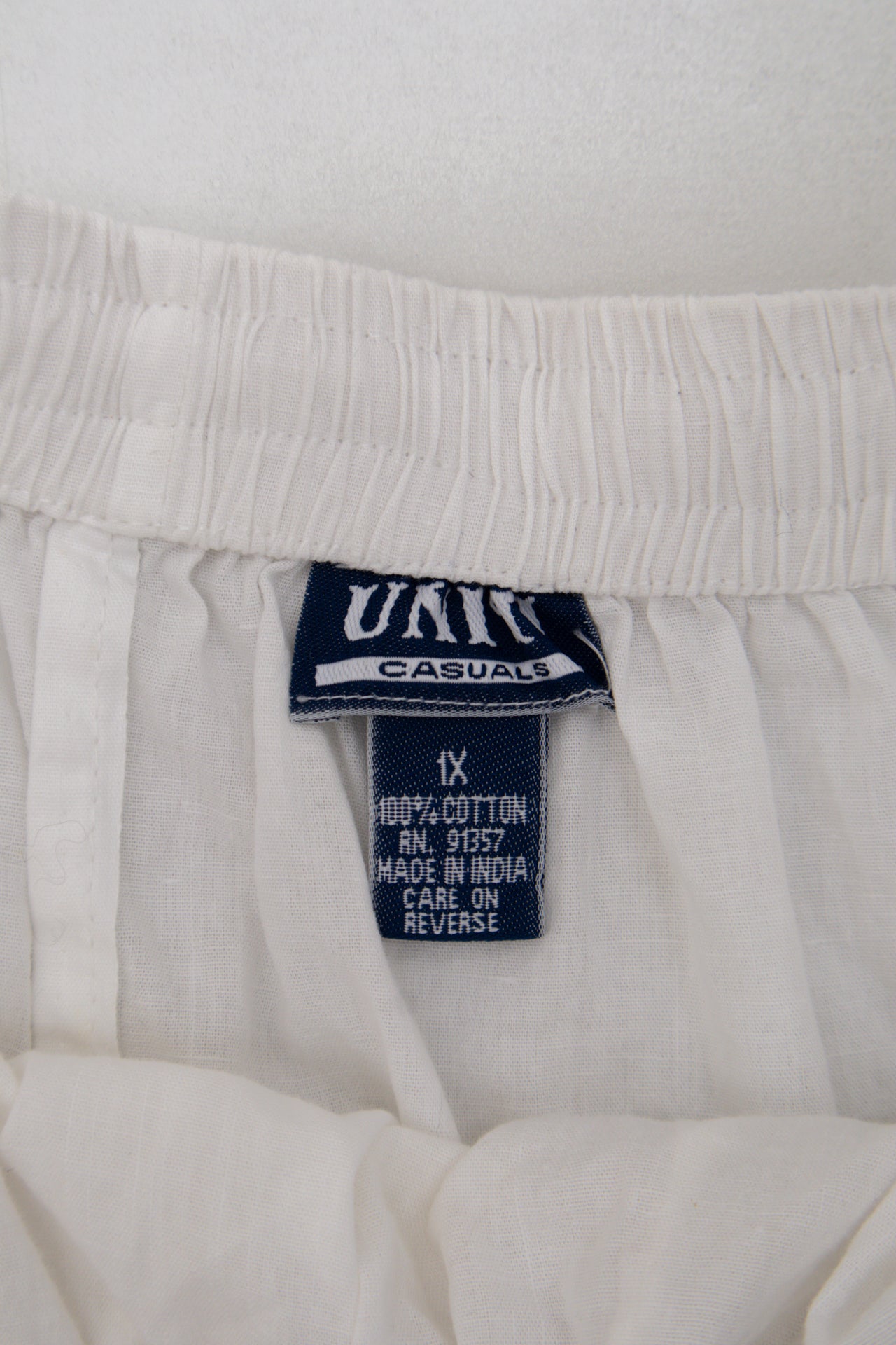 #115 Uniti Casuals Skirt White | c. 200 | Size 12/14