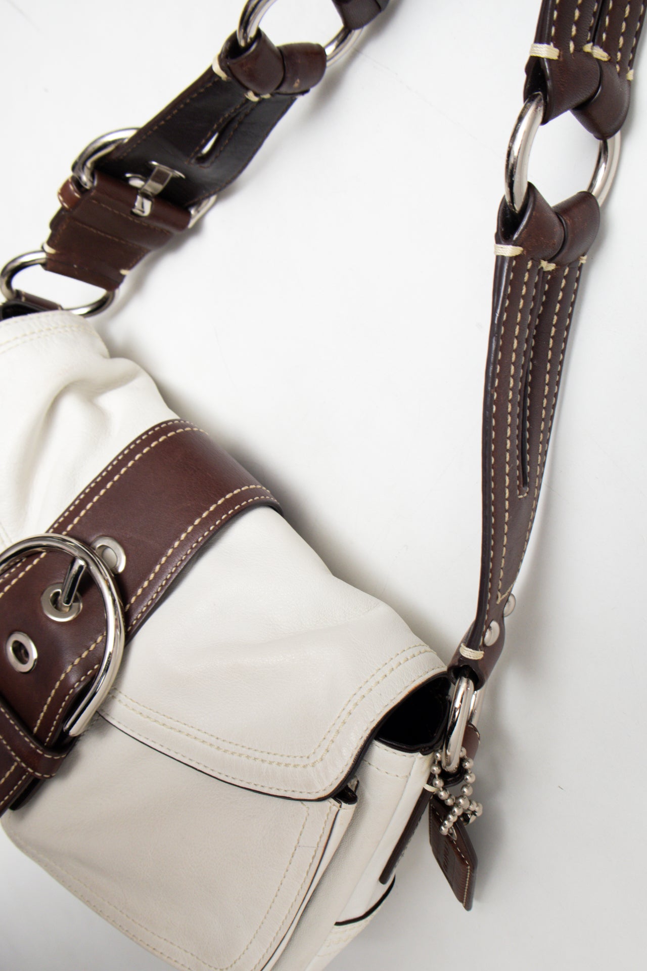 #238 Coach Soho Flat Bag White | c. 175