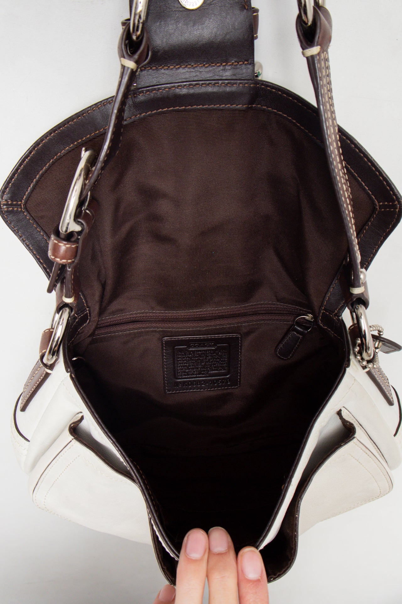 #238 Coach Soho Flat Bag White | c. 175