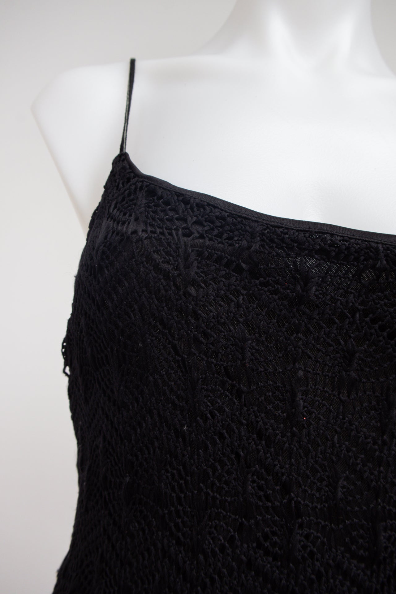 #105 Masq Black | c. 175 | Size 10/12